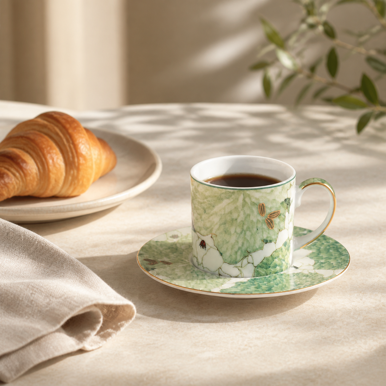 Chasing Light narrow cup and saucer with coffee and croissant