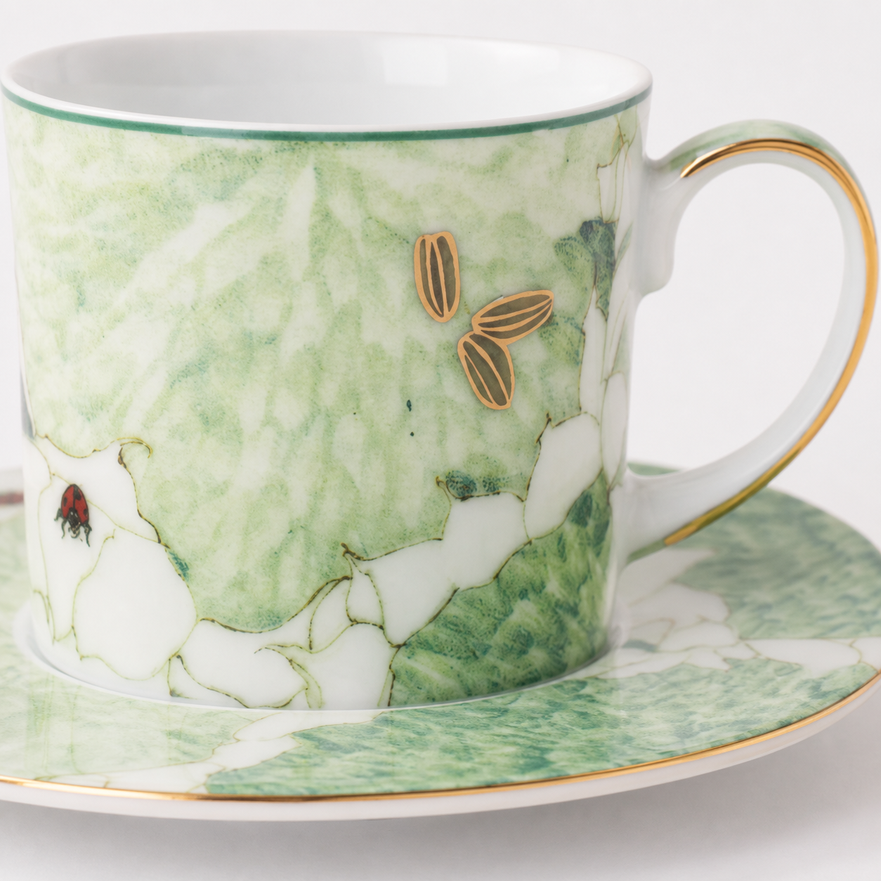 Close-up of Chasing Light floral decal, glaze and restrained gold details