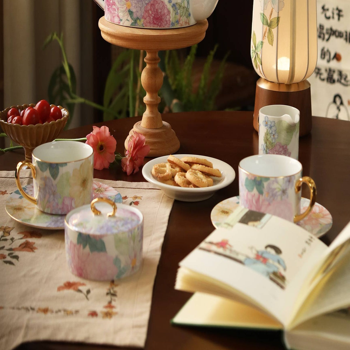 Courtyard Blossom Creamer with matching porcelain pieces in a real tea setting