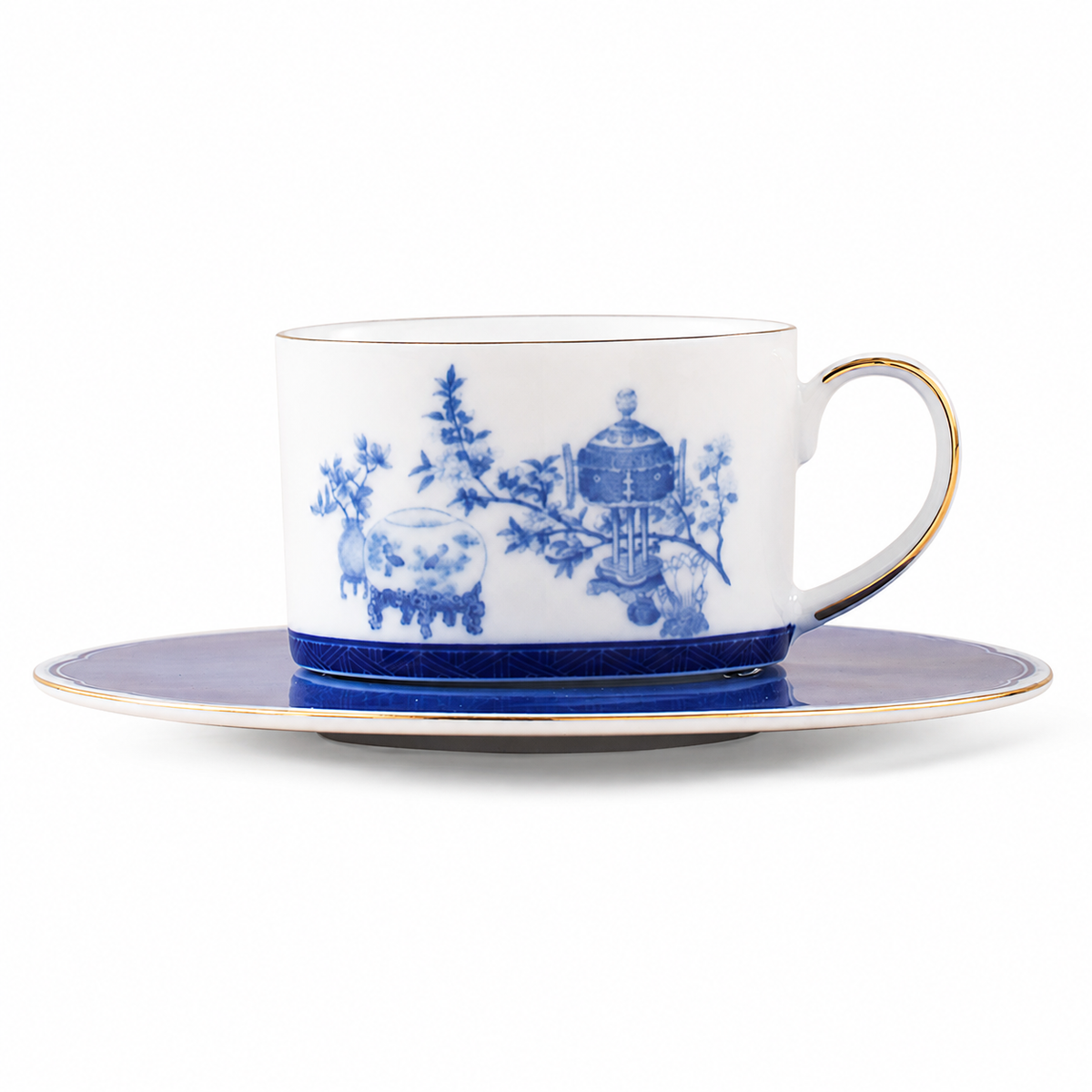 Golden Harmony cup and saucer showing blue decoration and fine gold accents