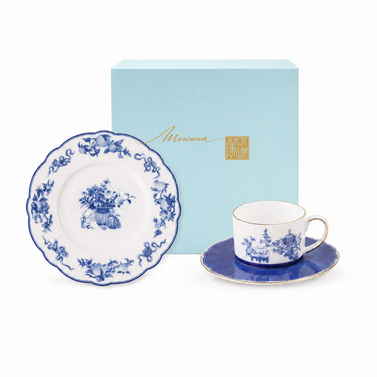 Golden Harmony cup, saucer and plate gift set with pale blue MOWANA box on pure white