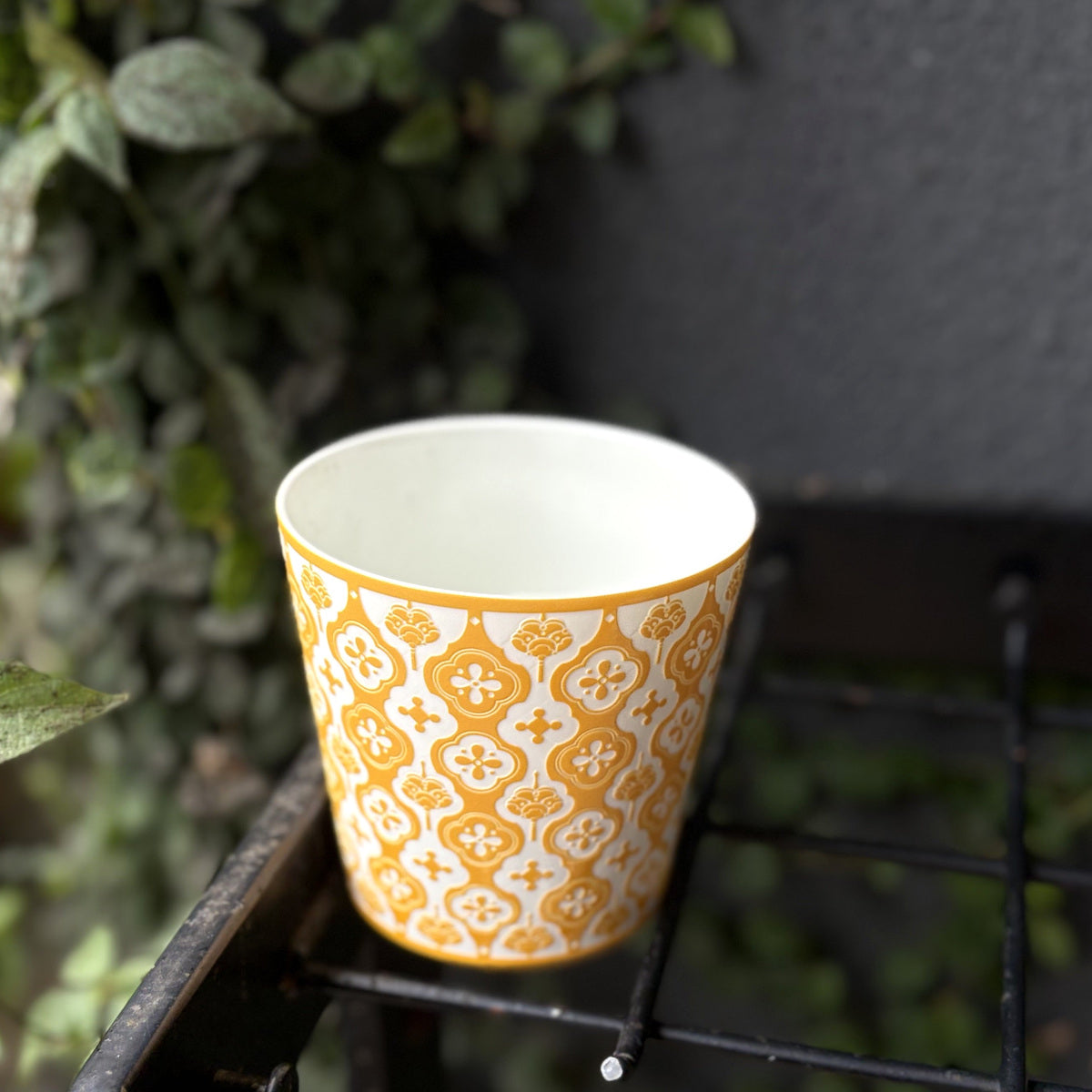 Yellow Baoxiang Choko Cup — white interior and open rim in natural light
